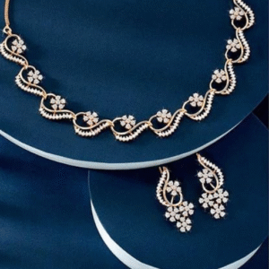 sekou rose gold floral necklace and earrings set